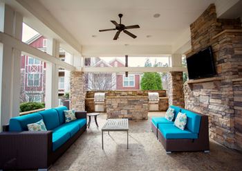 Outdoor lounge and outdoor kitchen grills area